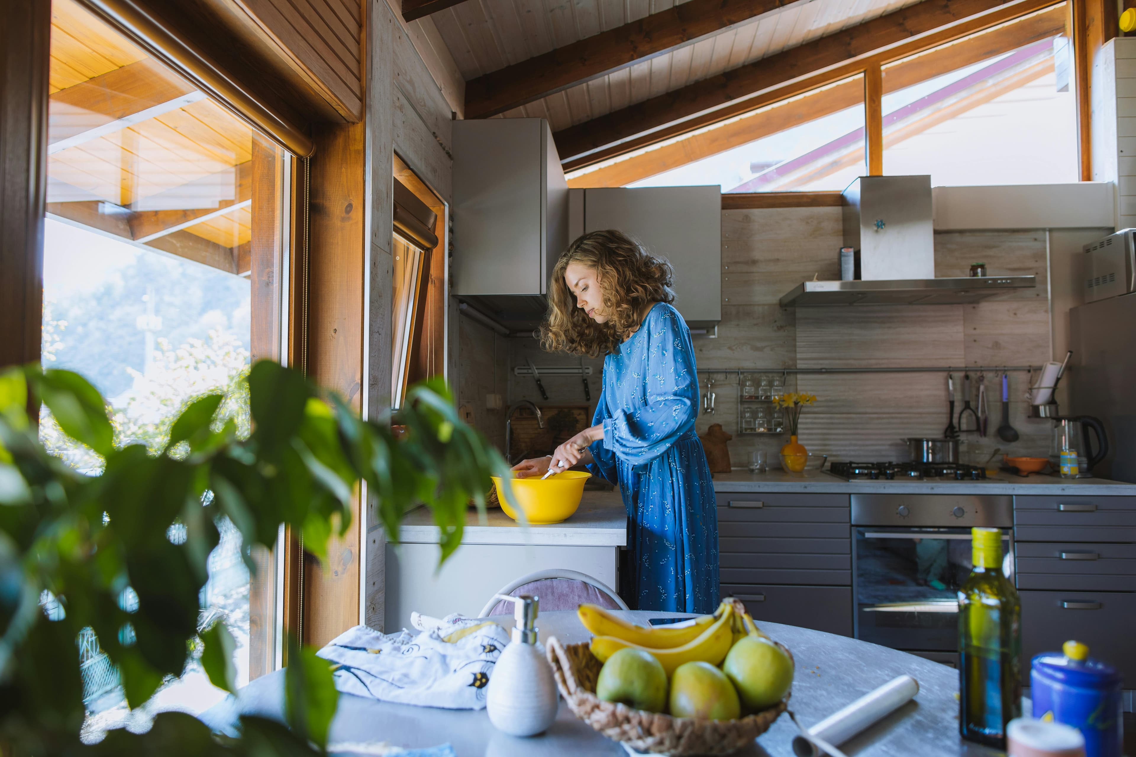 Woman cooking in her kitchen..